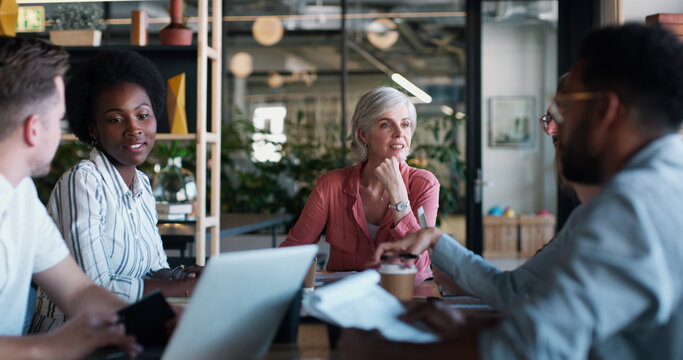 Business, team or woman with discussion in meeting for topic revision, writing advice or feedback. Journalists, lead editor and talking in newsroom for editorial guidance, story planning and update