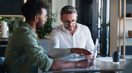 Mentor, reading and men with laptop, office and help with article on website, creative or...