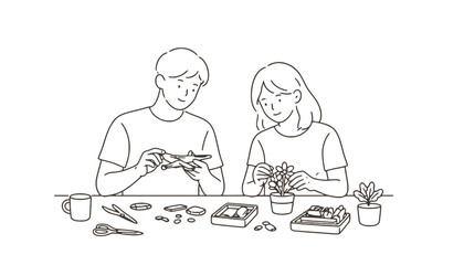 A couple engaged in gardening activities at a table with plants and tools