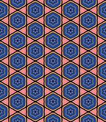 A blue and orange patterned design with a star in the center. The design is made up of squares and triangles