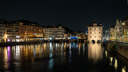 Fototapeta premium Zurich at night with longe exposure river view
