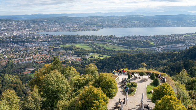  view of geneva and lake from Uetliberg view tower on a sunny and cloudy day