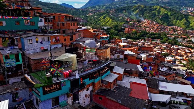 Drone shot of Medellin from above, highlighting the city&rsquo;s modern towers, compact neighborhoods, and dramatic mountainous surroundings