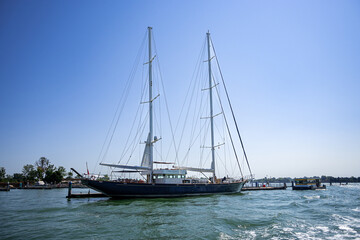 Fototapeta premium A sailing boat in the Venice lagoon (Italy)