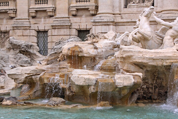 Water cascade at Trevi fountain in Rome © markobe