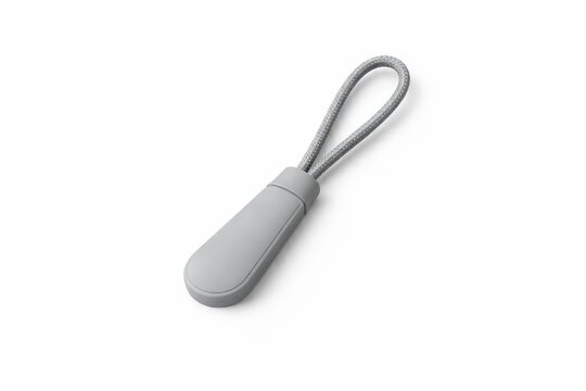 premium silicone zipper pull tab with smooth blank surface and rounded minimalist form isolated on white three quarter view