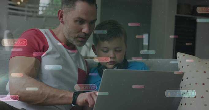 Placing laptop, father guiding son on sofa near window, pointing, tapping, red sleeves, headset, UI