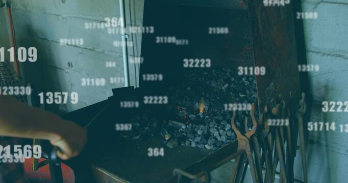 Left arm entering, worker heating rod in coals for forging while nudging embers, numbers drifting