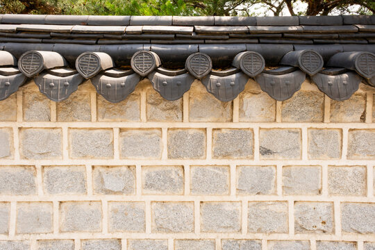 Traditional korean architecture fragment of stone wall, Seoul, South Korea.