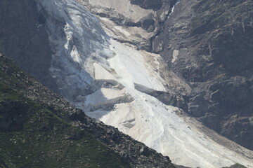 The North Caucasus glacier Semyorka on the slopes of Mount Donguz-Orun on a sunny summer day