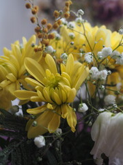 Fototapeta premium photo of a bouquet of yellow flowers, a beautiful bouquet of yellow and white flowers