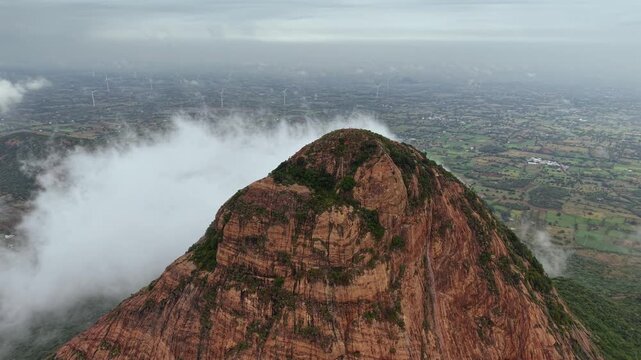 Aerial View of Kondarangi Hills with Rocky Peak and Clouds in Dindigul Tamil Nadu