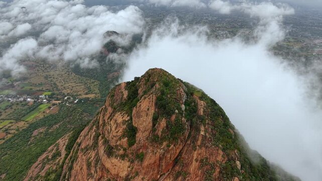 Aerial View of Kondarangi Hills with Rocky Peak and Clouds in Dindigul Tamil Nadu