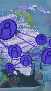 Tablet activating AR globe, site lead tapping while rotating purple nodes and checking connectivity