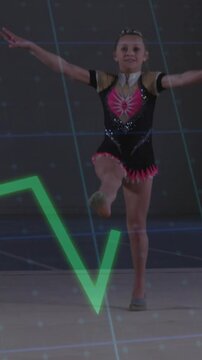 Vertical video: Girl in gymnastics pose marching straddle leap landing for show as graphs crossing
