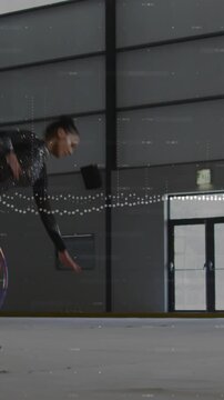 Female gymnast entering hall, picking hoop and doing hoop routine with dotted overlay matching hoop
