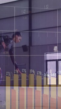 Vertical video: Hoop rolling, gymnast entering, guiding hoop through split, charts tracking score