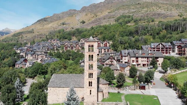 Aerial shot: Sant Climent de Ta&uuml;ll in the catalan Pyrenees, flying backwards