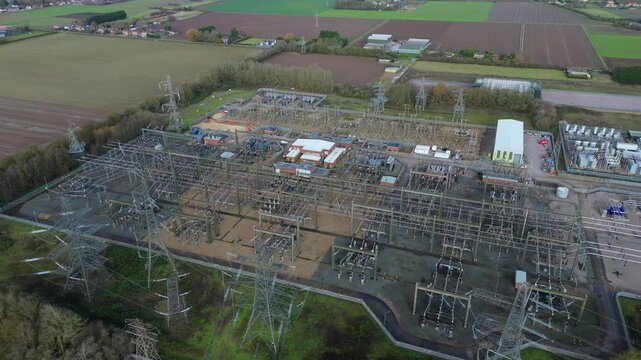 Aerial drone view of the massive Walpole Substation in Norfolk, UK, a critical node for the National Grid&rsquo;s transmission and stability network.