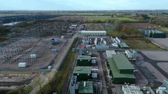 Industrial drone perspective of the Walpole energy hub, emphasizing the complex layout of the 400kV switchyard and grid integration assets.