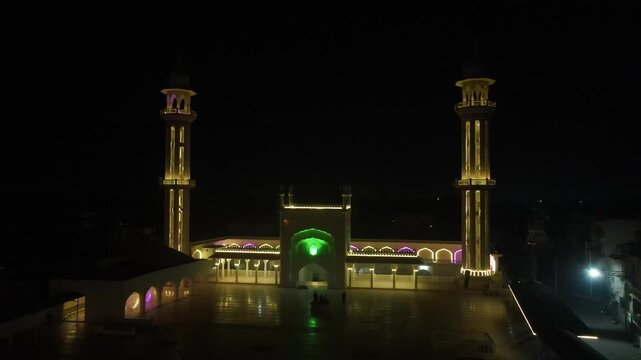 Aerial Night View of Jamia Masjid Al-Sadiq Illuminated for Ramadan with Shahi Bazaar, Bahawalpur, Pakistan -  4K Video, Drone Video, Aerial View
