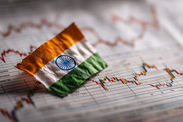 Naklejka premium Indian Economy Concept – Financial Data Display on National Flag of India