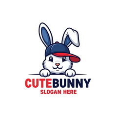 Fototapeta premium Cheerful cartoon rabbit character wearing a cap, peeking over a design element, fun animal mascot illustration.