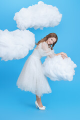 Fototapeta premium Heavenly Cloud Girl