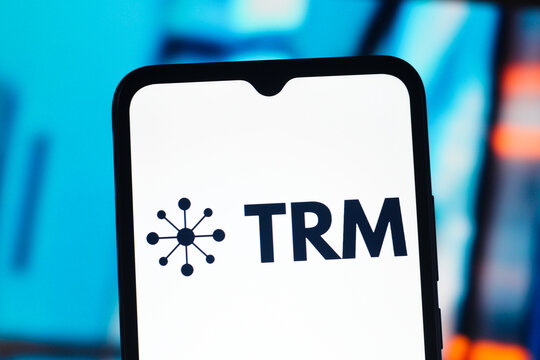 In this photo illustration, the TRM Labs logo is seen displayed on a smartphone screen.