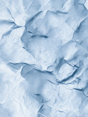 Fototapeta premium Crumpled blue paper texture closeup.