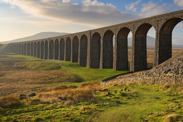 Close-up view of The Ribblehead Viaduct on a sunny morning in The Yorkshire Dales National Park, UK. © _Danoz