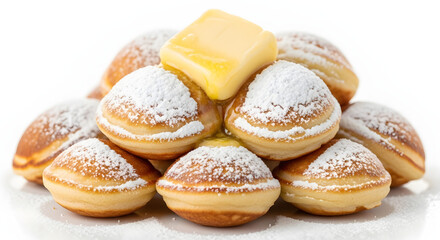 Fluffy mini Dutch pancakes with butter and powdered sugar, isolated on a plain white background