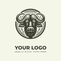 Fototapeta premium A vintage-style woodcut illustration of a bull's head logo with a circular design and text space for a slogan on a beige background.