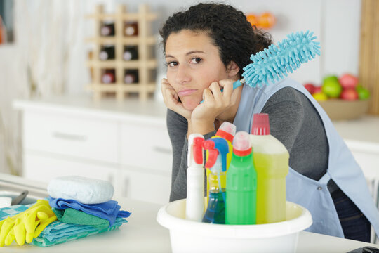 young woman tired of cleaning