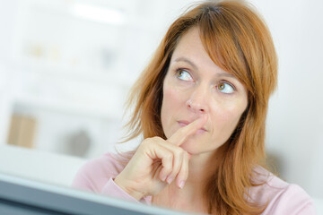 a woman is thinking about something