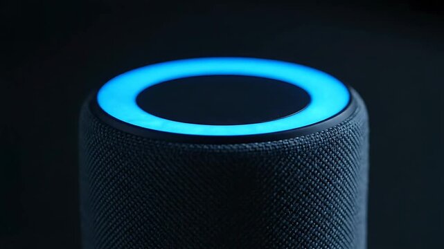 Charcoal Fabric Cylinder Smart Speaker With Glowing Blue LED Ring Light