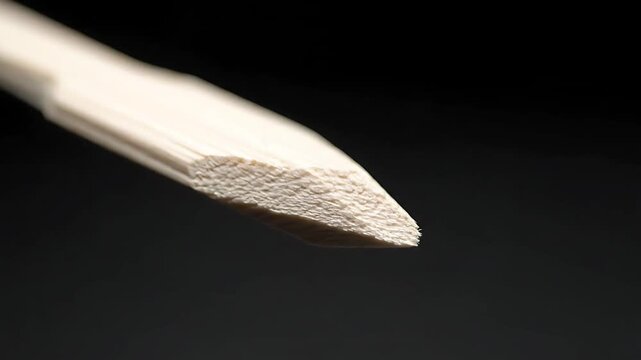 Macro Closeup of Sharpened Natural Wooden Skewer Tip
