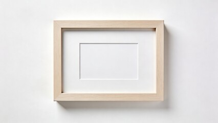 displays a minimalist, rectangular picture frame with a simple and elegant design. The frame is made of a light-colored wood or wood-like material, featuring a smooth finish. It has a narrow border th