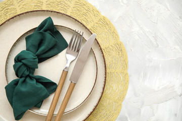 Beautiful table setting on grey background