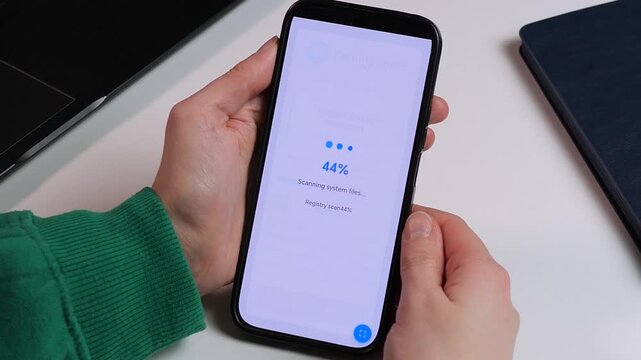 Smartphone antivirus app detecting system threats. Sequential footage shows scanning process and Threats Detected alert with Trojan and Adware. Perfect for mobile safety promos, cybercrime awareness