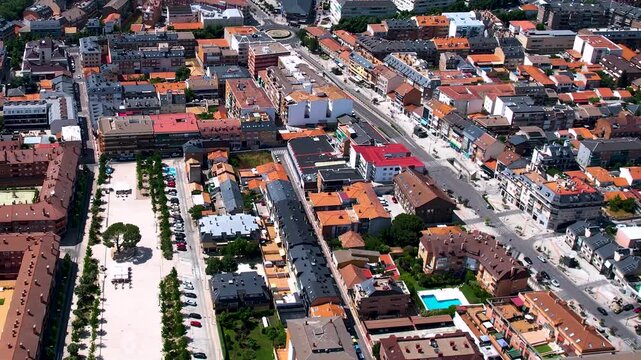 Aerial panorama view around the downtown of the city Collado Villalba  in Spain on a sunny summer noon.