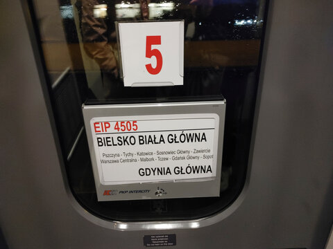 Destination sign on a train door for Bielsko Biala and Gdynia route