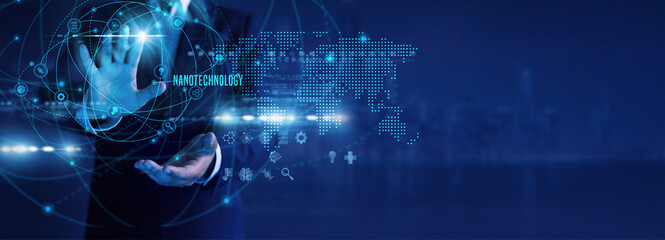 Research scientist analyzing nanotechnology materials, molecular structures and lab data on...