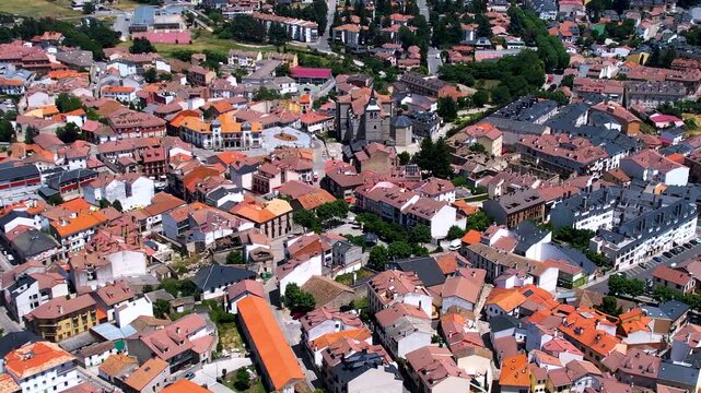 Aerial panorama view around the downtown of the city El Espinar  in Spain on a sunny summer noon.