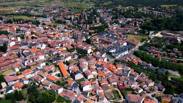 Aerial panorama view around the downtown of the city El Espinar  in Spain on a sunny summer noon.