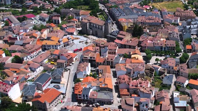 Aerial panorama view around the downtown of the city El Espinar  in Spain on a sunny summer noon.