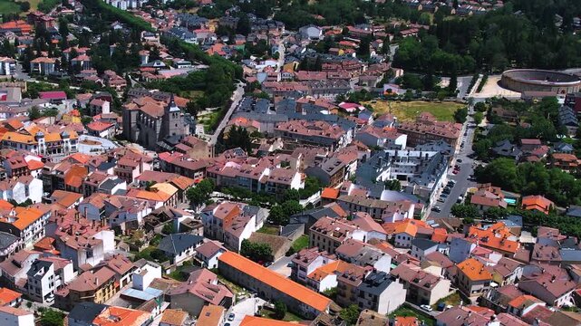 Aerial panorama view around the downtown of the city El Espinar  in Spain on a sunny summer noon.