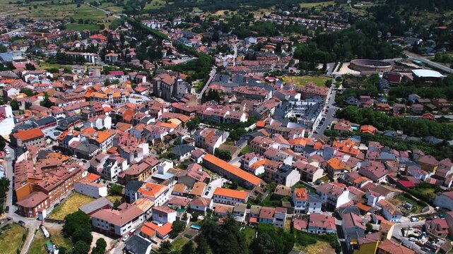 Aerial panorama view around the downtown of the city El Espinar  in Spain on a sunny summer noon.