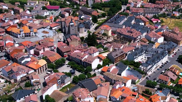 Aerial panorama view around the downtown of the city El Espinar  in Spain on a sunny summer noon.
