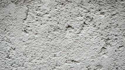 Obraz premium Close-Up Texture of a Rough Grey Concrete Surface for Industrial Background and Architectural Construction Projects